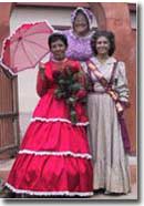 3 women in 19th century clothing